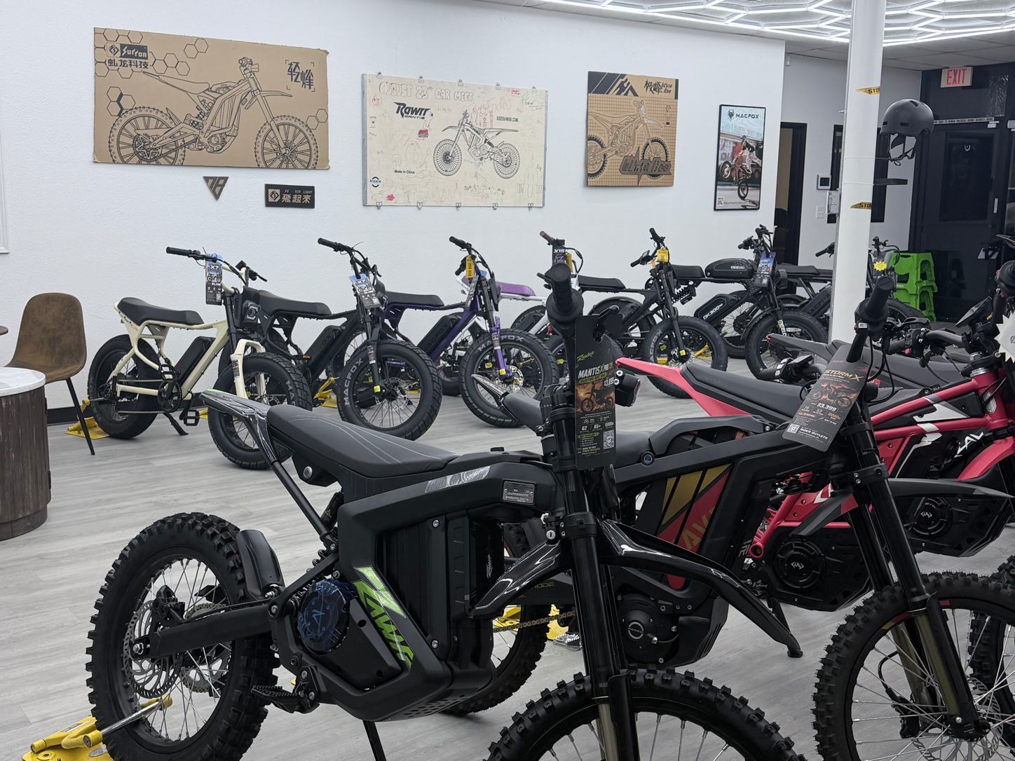 Electric dirt bikes inside the Rider Outlets showroom