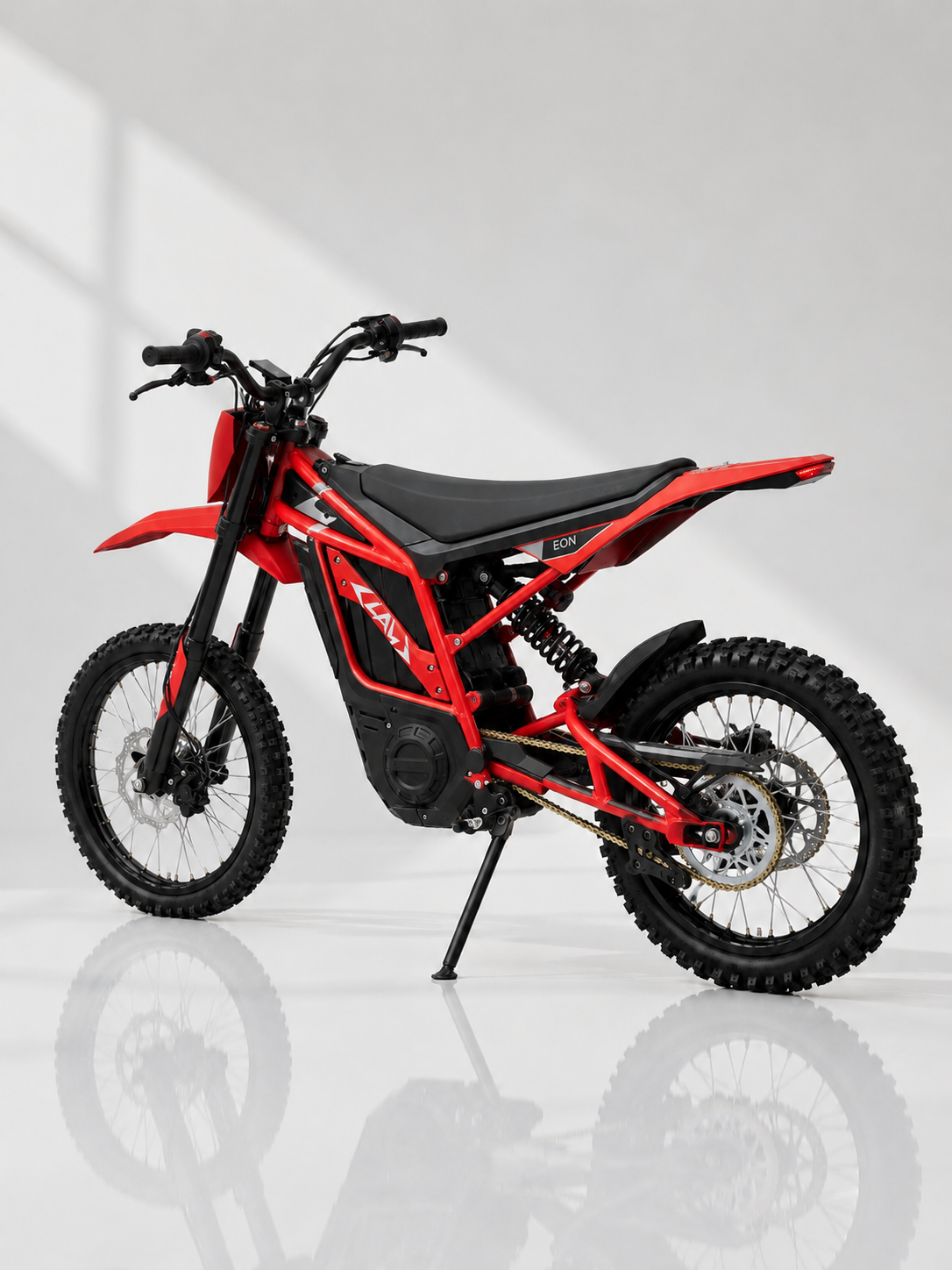 Claw Eon Standard - Red electric dirt bike side profile view at Rider Outlets