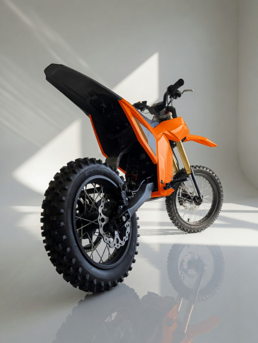 78 FORGED Phase I Orange electric dirt bike rear three-quarter view