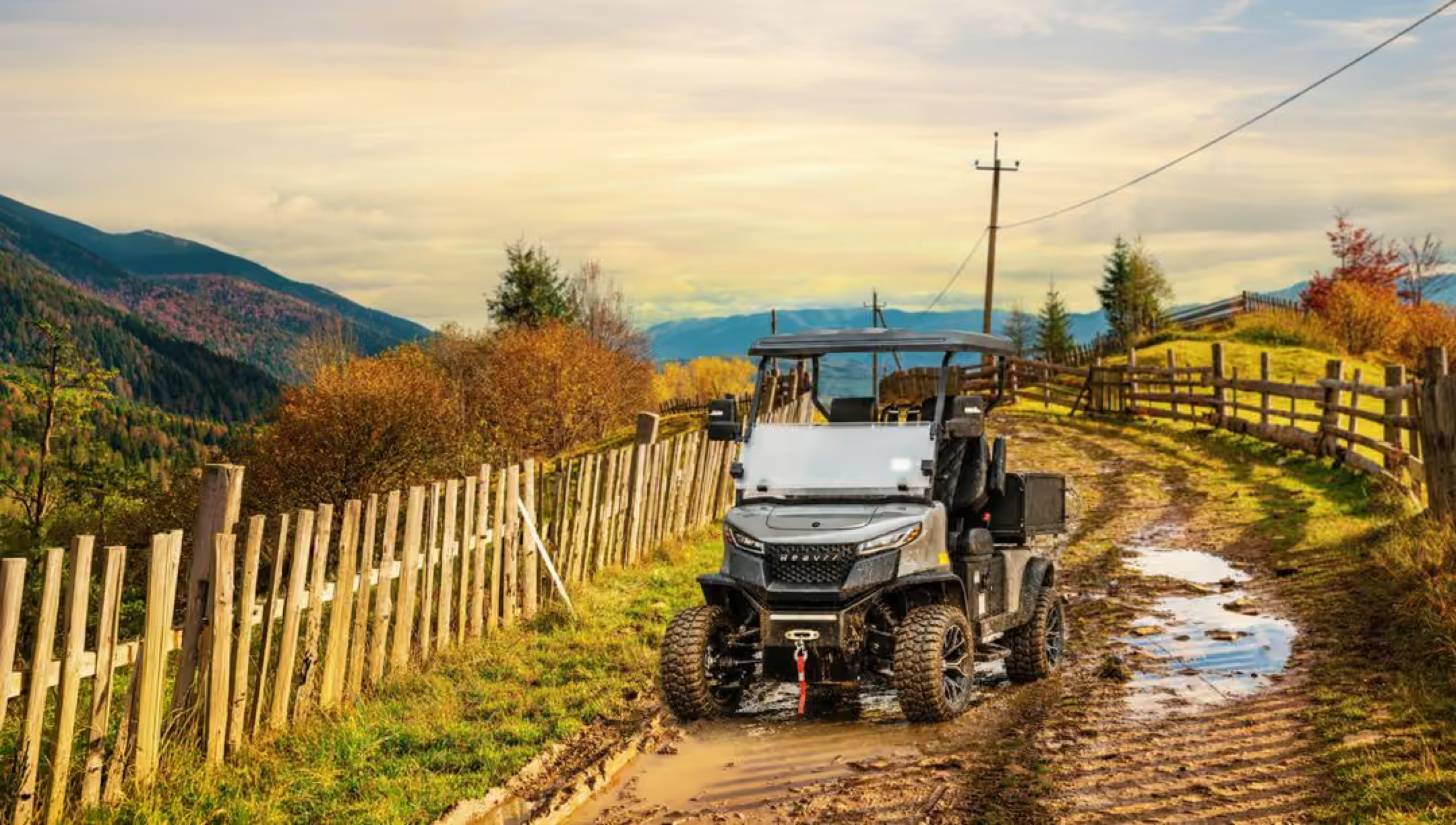 Beavrr electric utility vehicle working on a rugged property road